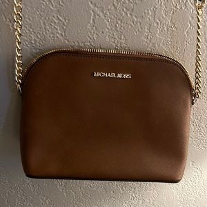 MICHAEL Michael Kors "Jet Set" travel bag in saffiano leather w/golden hardware.